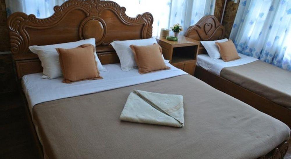 Bright Hotel Няунг Шве Екстериор снимка